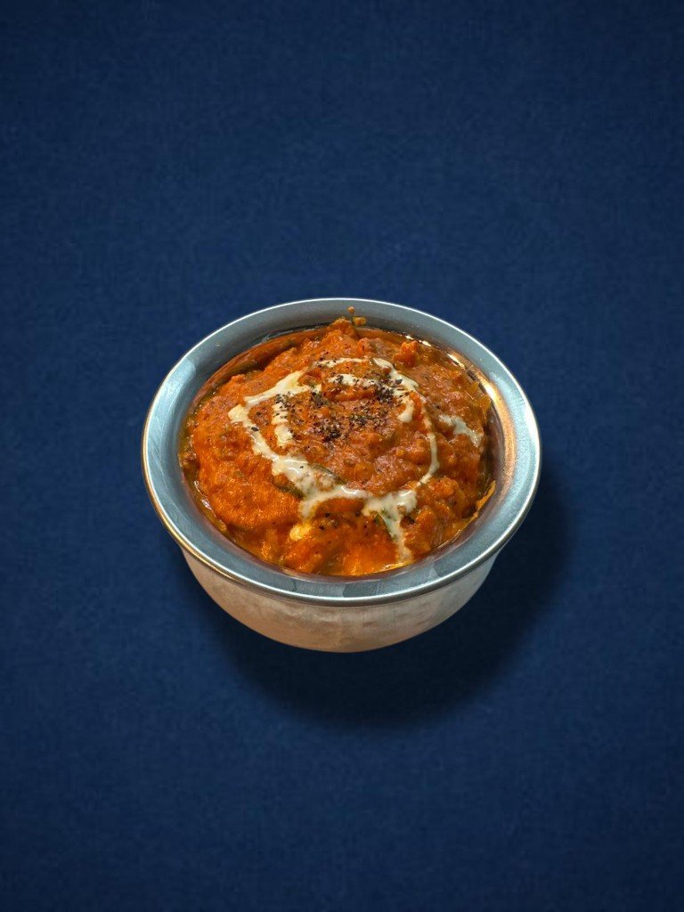 Dal finished with cream and pepper